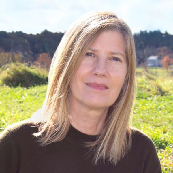 Jill Hennessey smiling outdoors